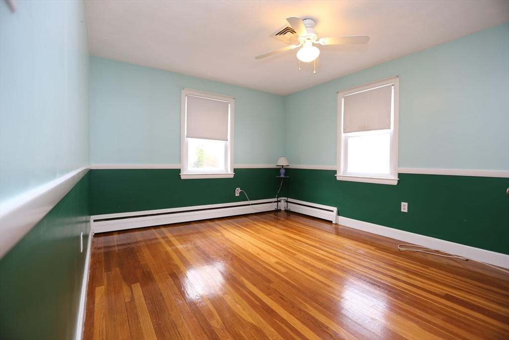 12 Lasell Street Boston, MA 02132 - Photo 10 of 22 a view of room with window and ceiling fan