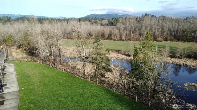 a view of lake with green space