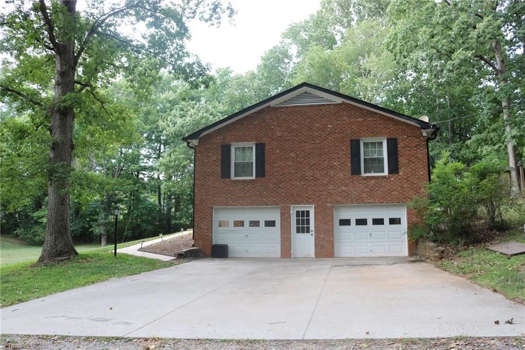 8455 Jefferson Church Road Rural Hall, NC 27045 - Photo 5 of 31 2 car garage/door leading to basement