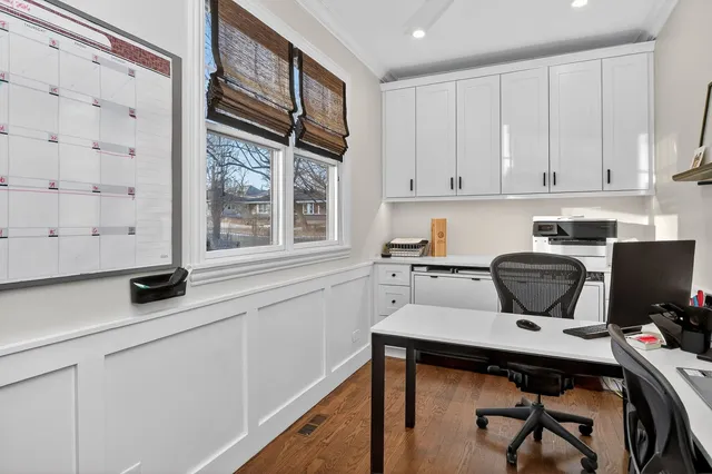 a kitchen with a stove a sink and a refrigerator