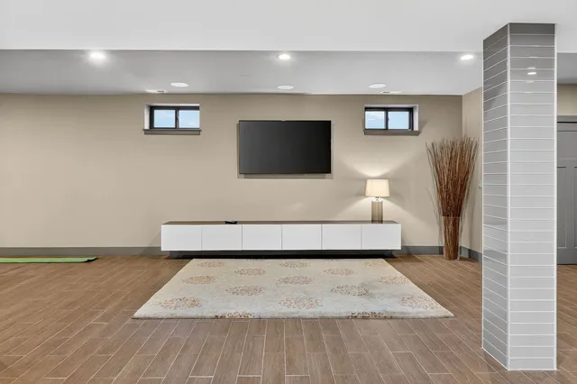 a living room with a couch and a flat screen tv