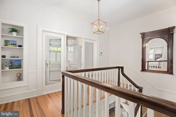 a bedroom with a bed and dresser