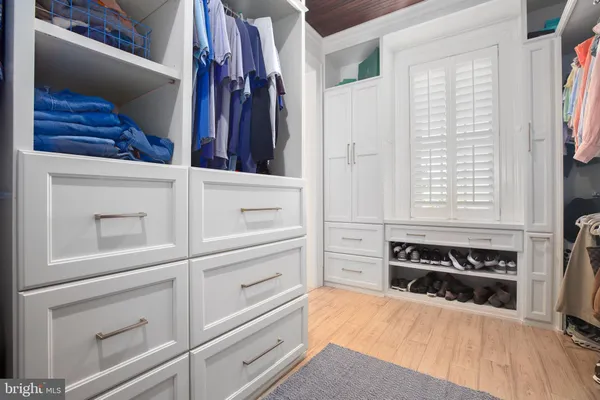 a view of a kitchen with cabinets