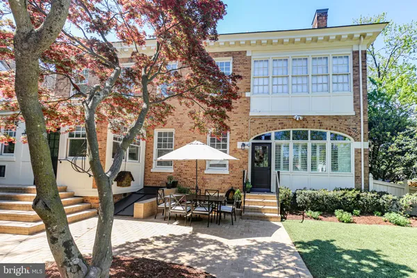 a kitchen with counter top space sink and center island