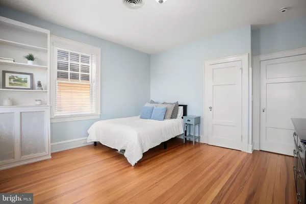 a room with gym equipment and a table