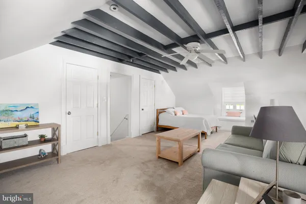 a patio with a patio table and chairs