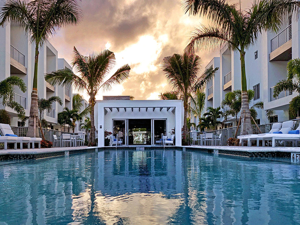 4010 Northwest 18th Way Boca Raton, FL 33431 - Photo 4 of 13 a house with swimming pool