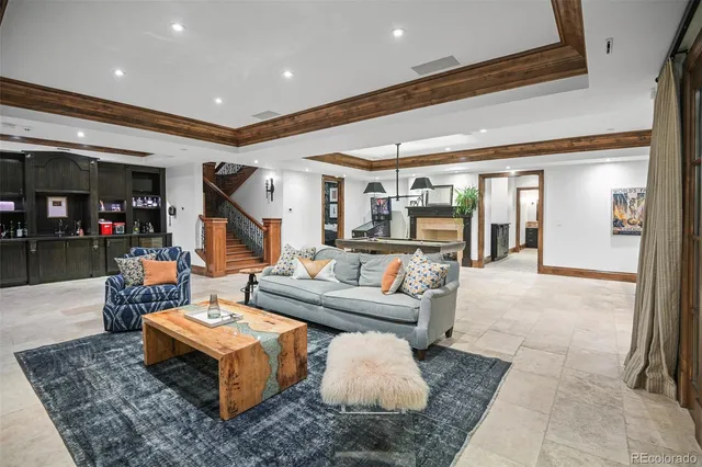 a living room with furniture and a table