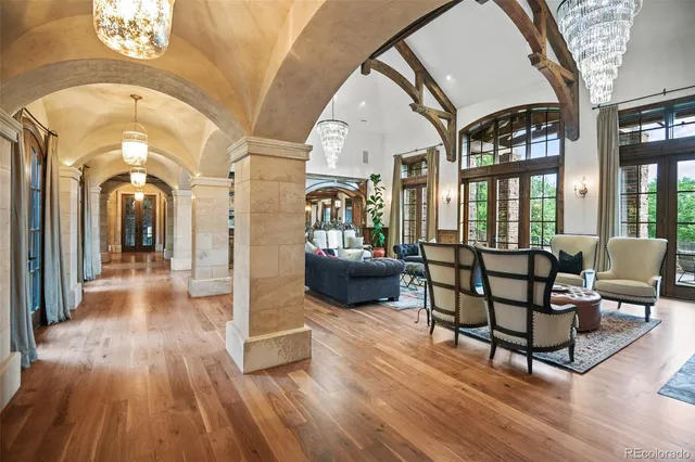 a lobby with furniture and wooden floor