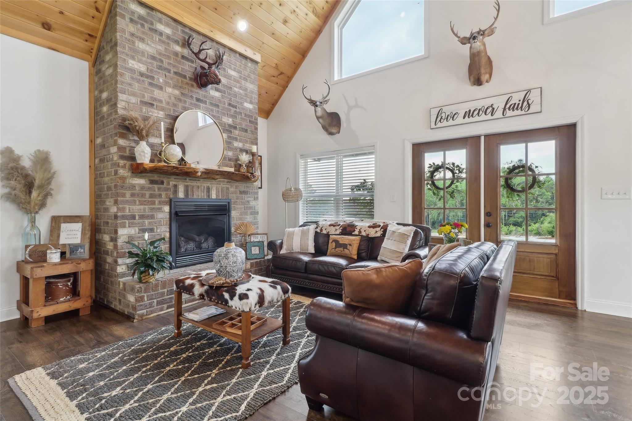 19966 Angelus Road Jefferson, SC 29718 - Photo 10 of 28 a living room with furniture and a fireplace