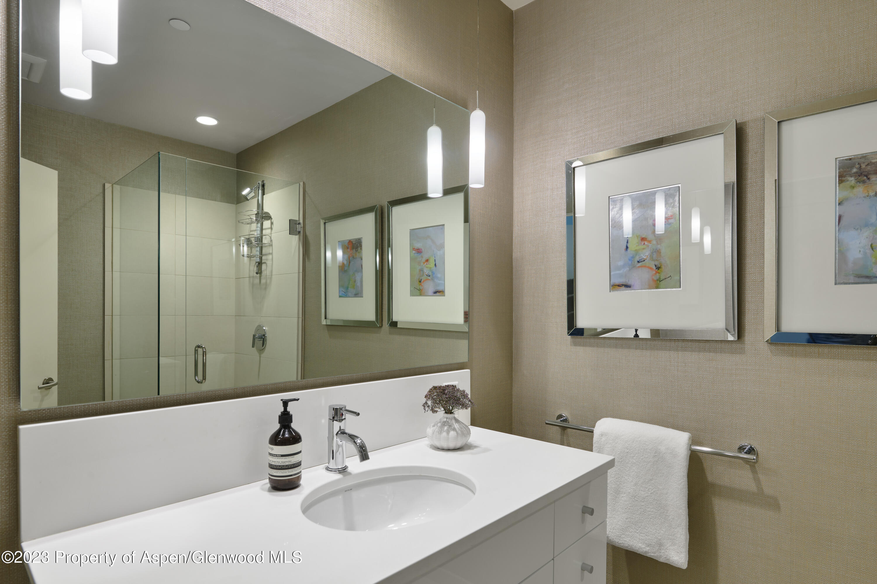 202 Evans Road, Unit 203 Basalt, CO 81621 - Photo 14 of 24 a bathroom with a sink and a mirror