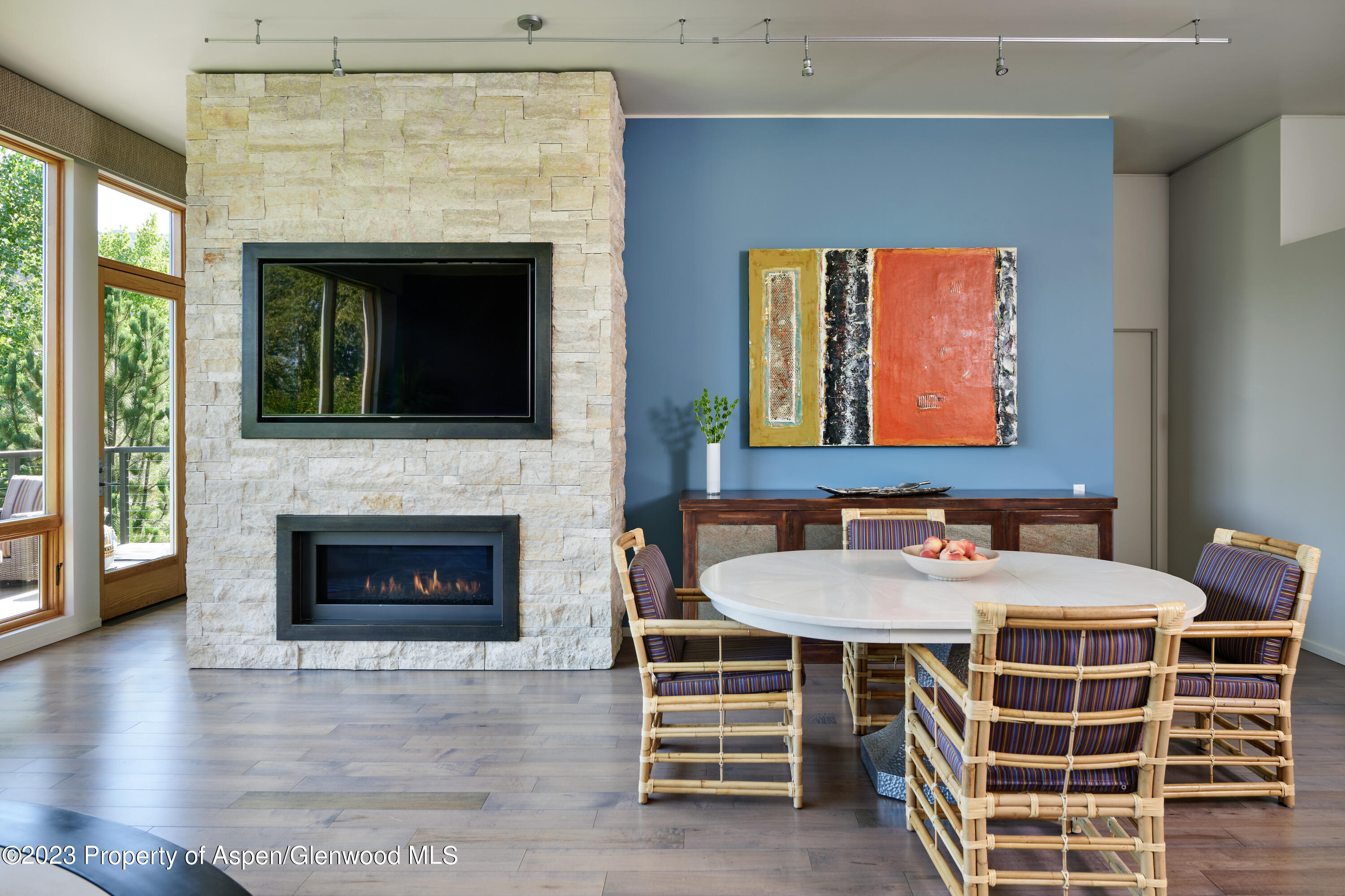 202 Evans Road, Unit 203 Basalt, CO 81621 - Photo 6 of 24 a view of a livingroom with furniture and a fireplace