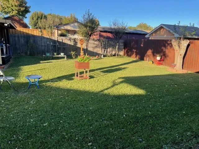 an ocean view with residential house and outdoor space