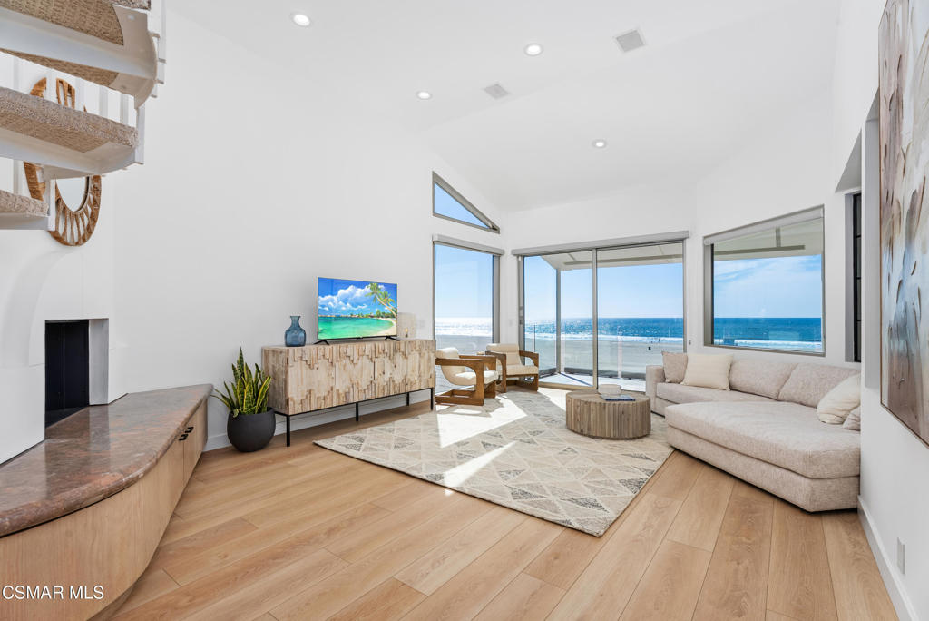 4 Jib Street, Unit 13 Marina del Rey, CA 90292 - Photo 1 of 53 a living room with furniture and a couch