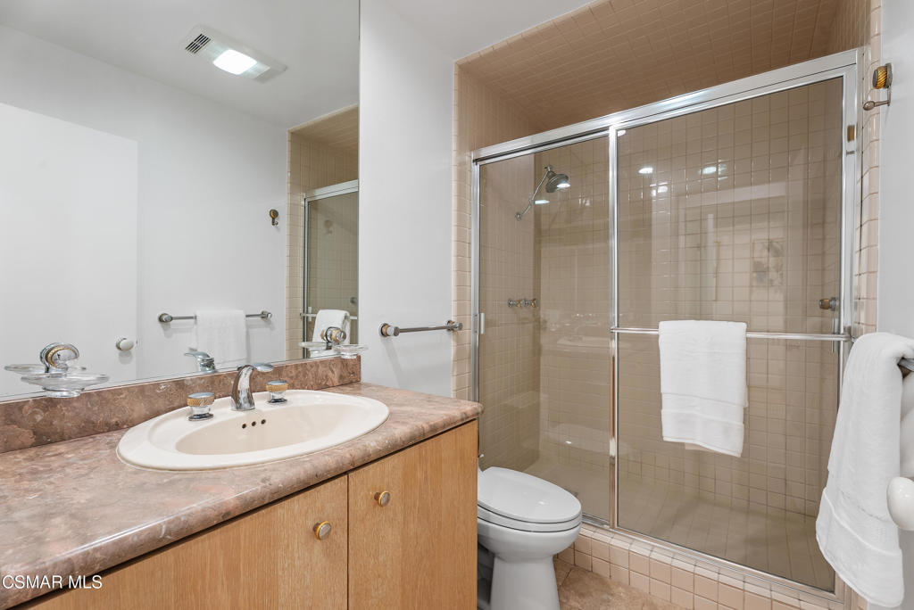 4 Jib Street, Unit 13 Marina del Rey, CA 90292 - Photo 31 of 53 a bathroom with a sink toilet and shower