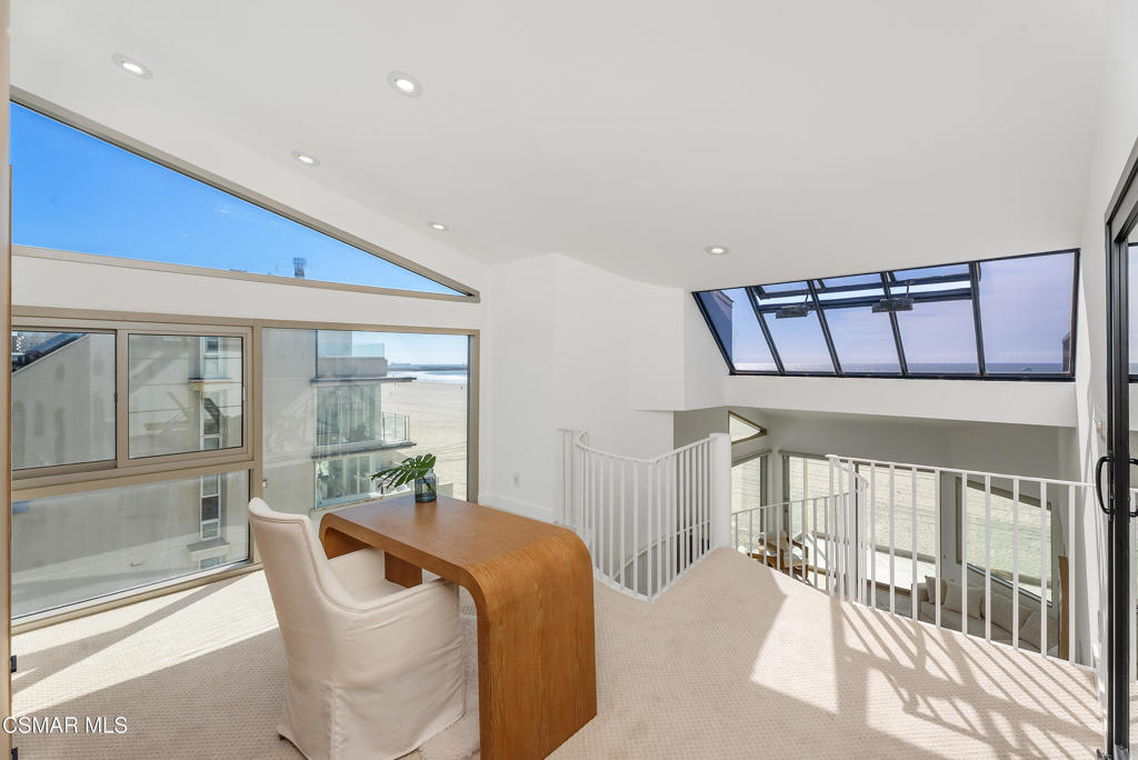 4 Jib Street, Unit 13 Marina del Rey, CA 90292 - Photo 32 of 53 a living room with furniture and a large window