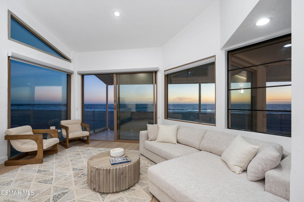 4 Jib Street, Unit 13 Marina del Rey, CA 90292 - Photo 9 of 53 a living room with furniture and a large window