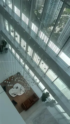 a gym room with lots of table and chairs