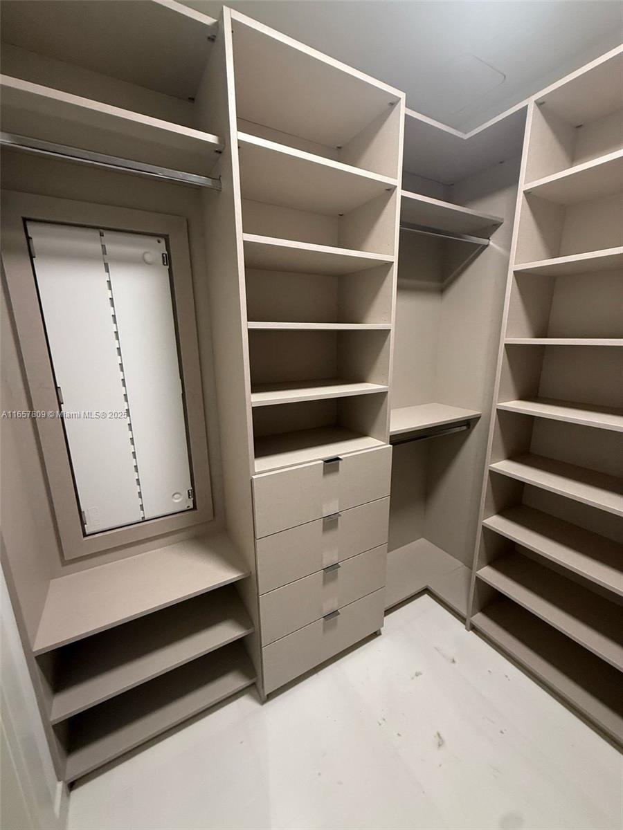 300 Biscayne Blvd Way, Unit 1909 Miami, FL 33131 - Photo 35 of 42 a view of walk in closet