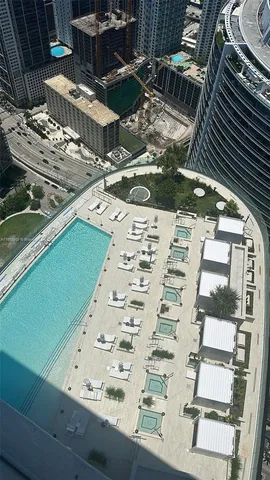 a view of a backyard with sitting area