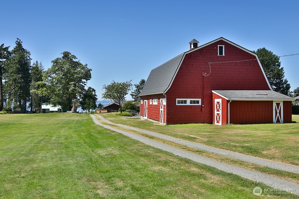 364 Gramayre Road Coupeville, WA 98239 - Photo 14 of 38 a front view of a house with a yard