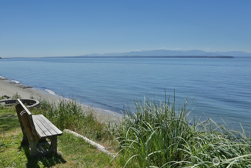 364 Gramayre Road Coupeville, WA 98239 - Photo 20 of 38 a view of a lake with a outdoor space