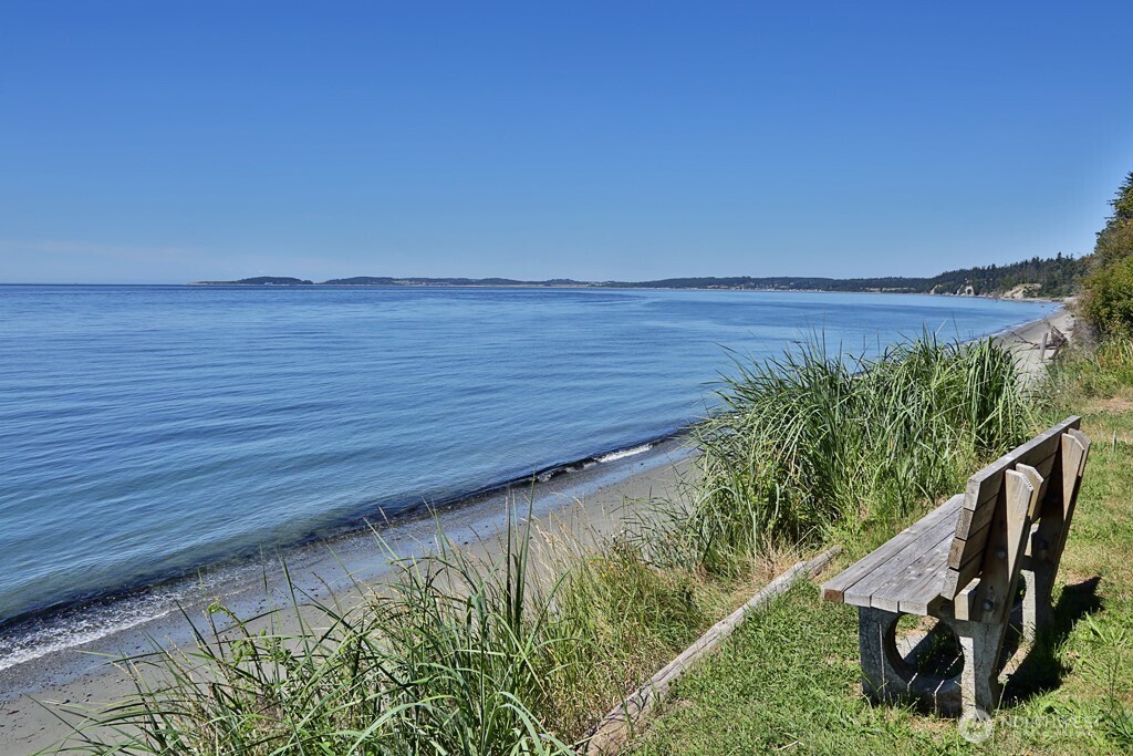 364 Gramayre Road Coupeville, WA 98239 - Photo 25 of 38 a view of a garden and chairs