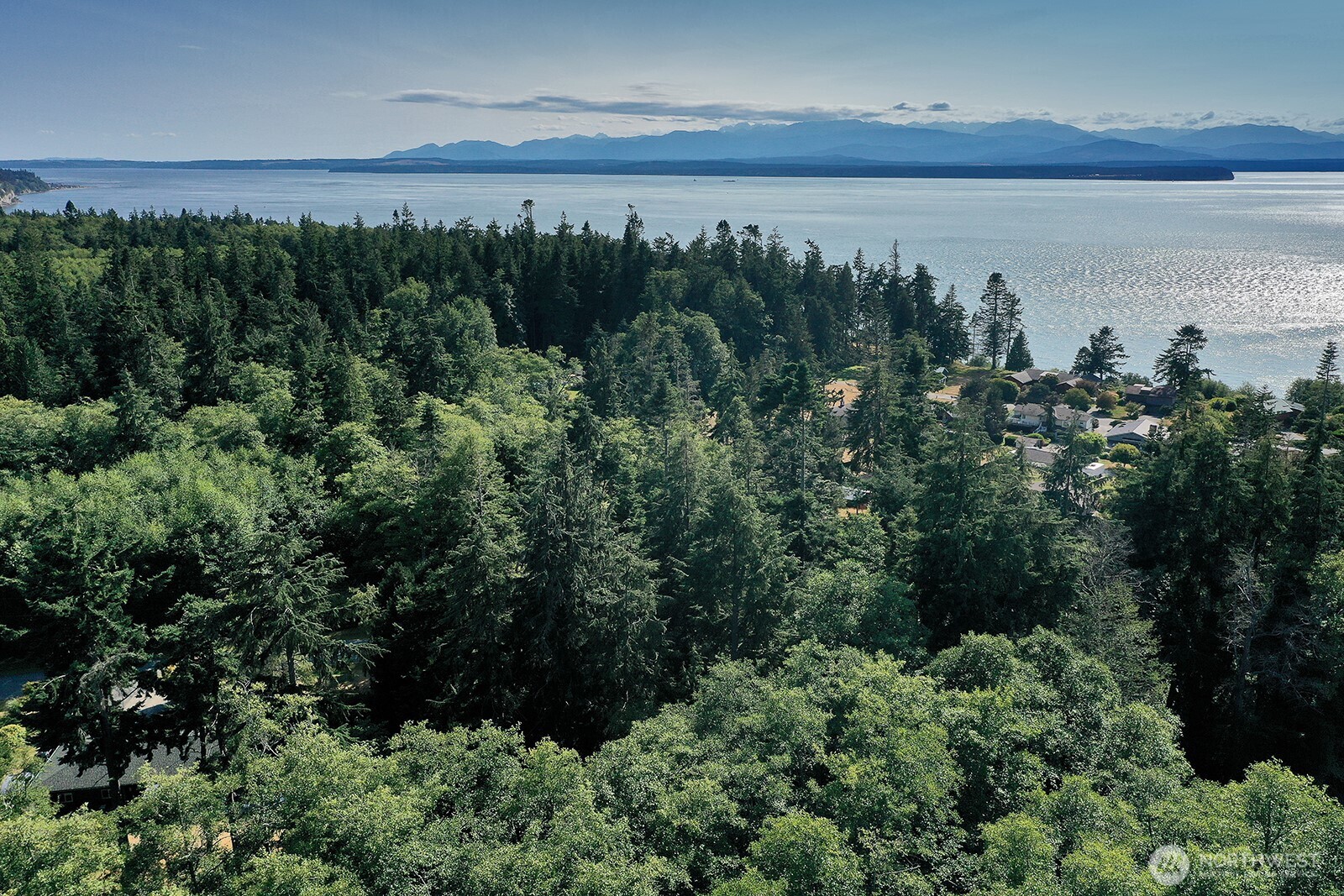 364 Gramayre Road Coupeville, WA 98239 - Photo 26 of 38 a view of a lake and green valley