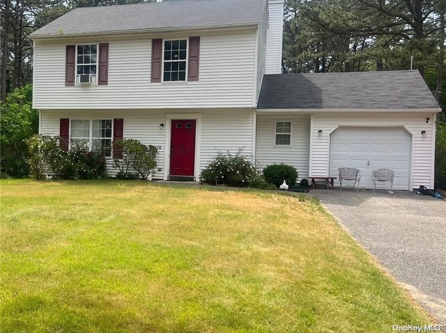 a front view of a house with yard