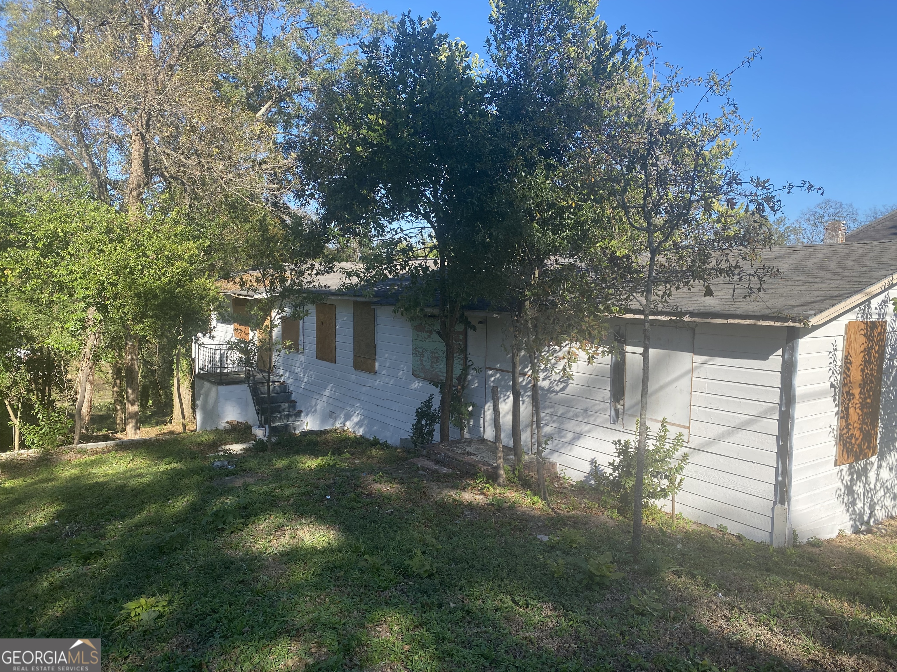 2125-2127 Neal Avenue Macon, GA 31204 - Photo 2 of 6 a view of a house with a yard