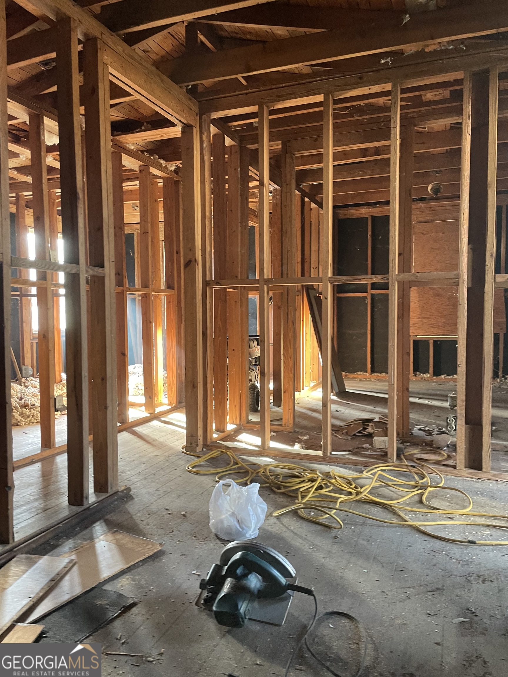 2125-2127 Neal Avenue Macon, GA 31204 - Photo 4 of 6 a backyard of a house with barbeque oven table and chairs