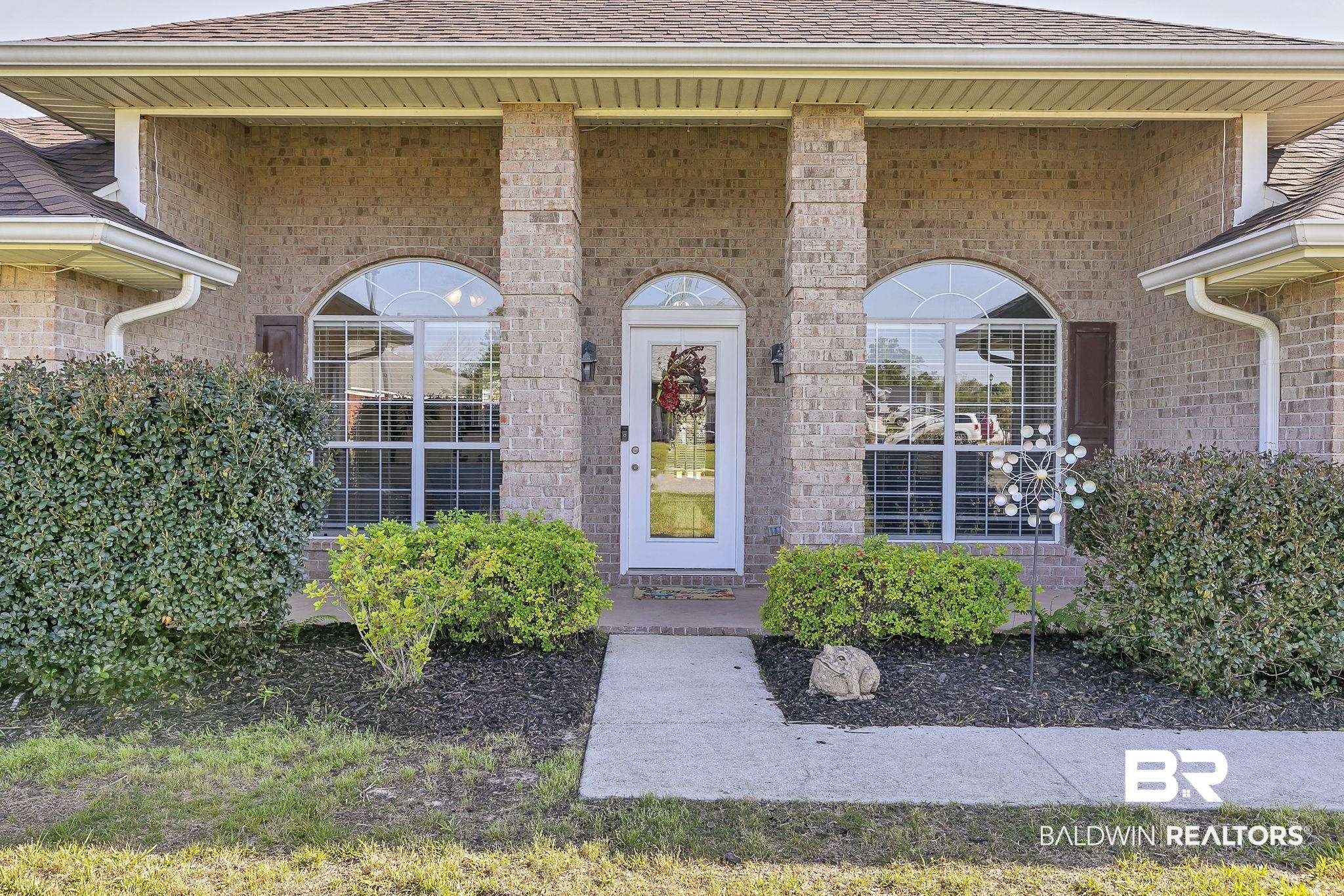 16358 Tempest Drive Foley, AL 36535 - Photo 5 of 46 Property entrance with a shingled roof and brick siding