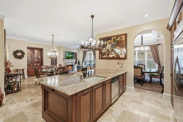a view of living room filled with furniture and window