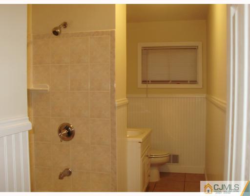 33 Brandeis Road Old Bridge, NJ 08859 - Photo 5 of 10 a bathroom with a shower
