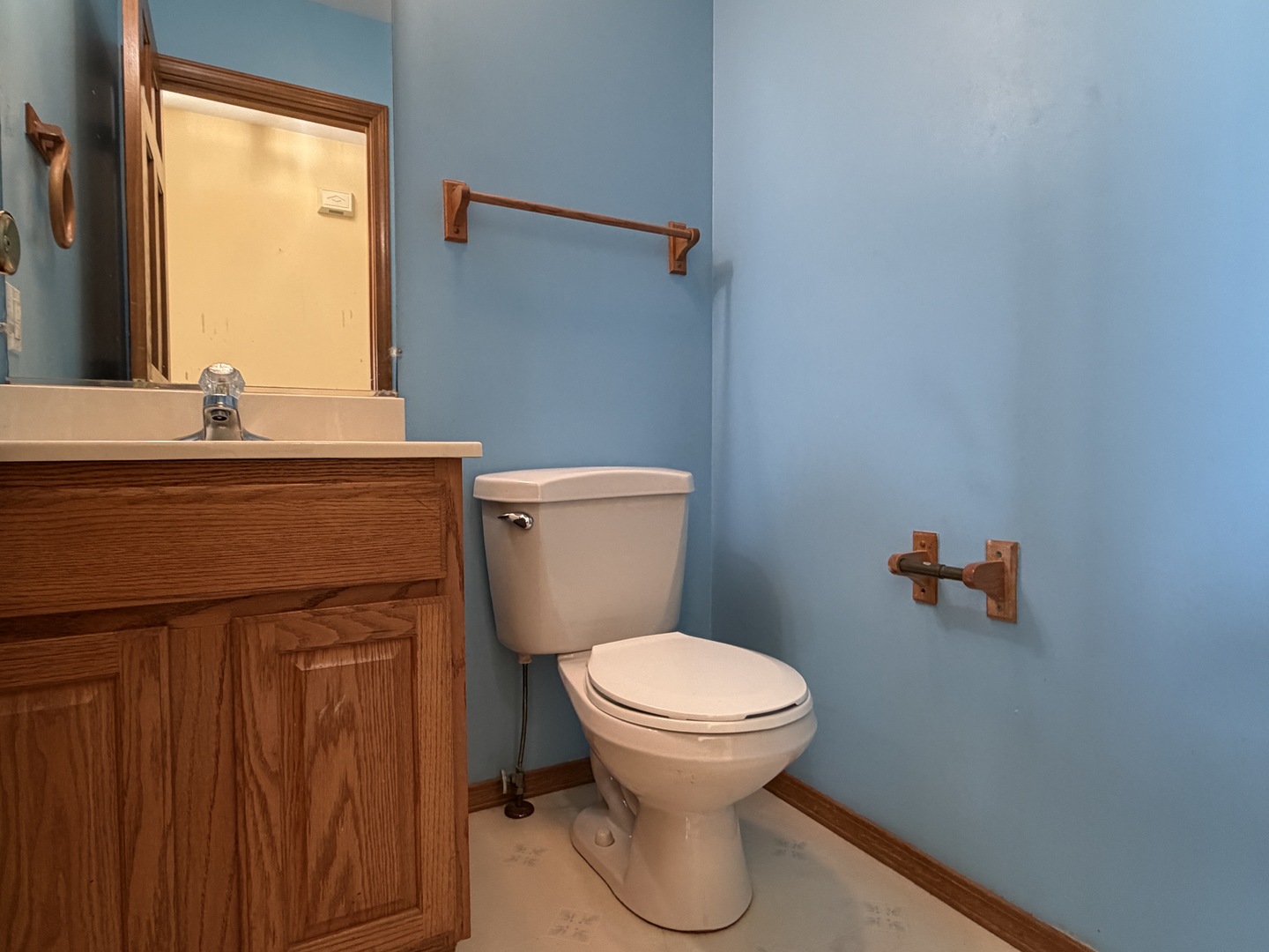 4511 Copper Ridge Road Champaign, IL 61822 - Photo 22 of 55 a bathroom with a toilet and a sink