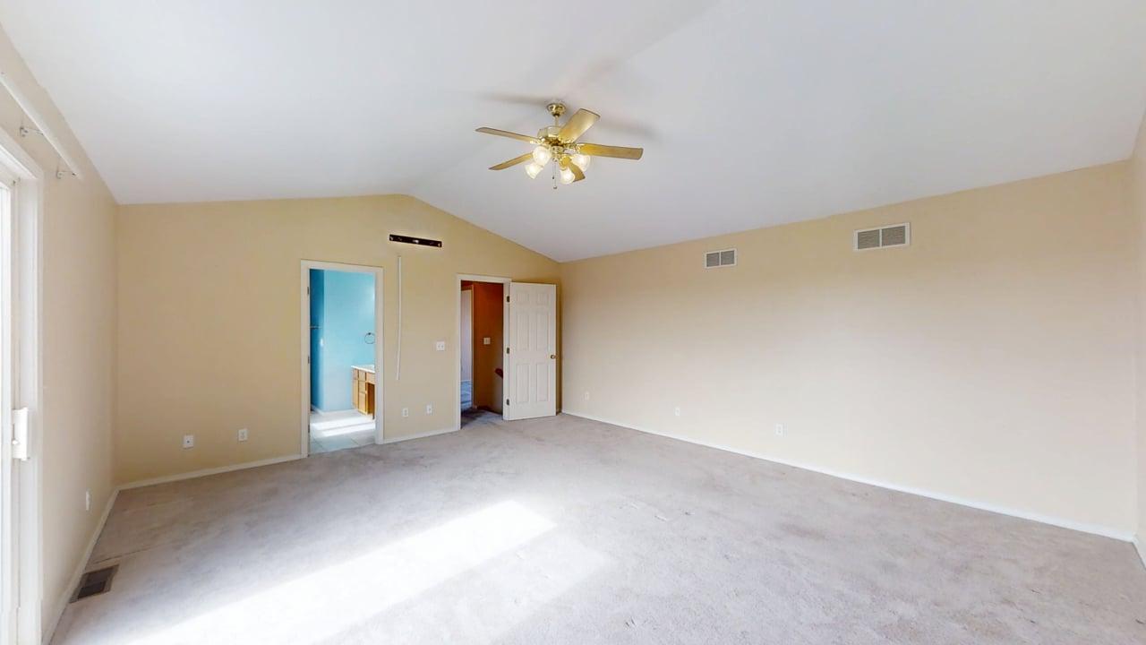 4511 Copper Ridge Road Champaign, IL 61822 - Photo 25 of 55 a view of a livingroom with a ceiling fan