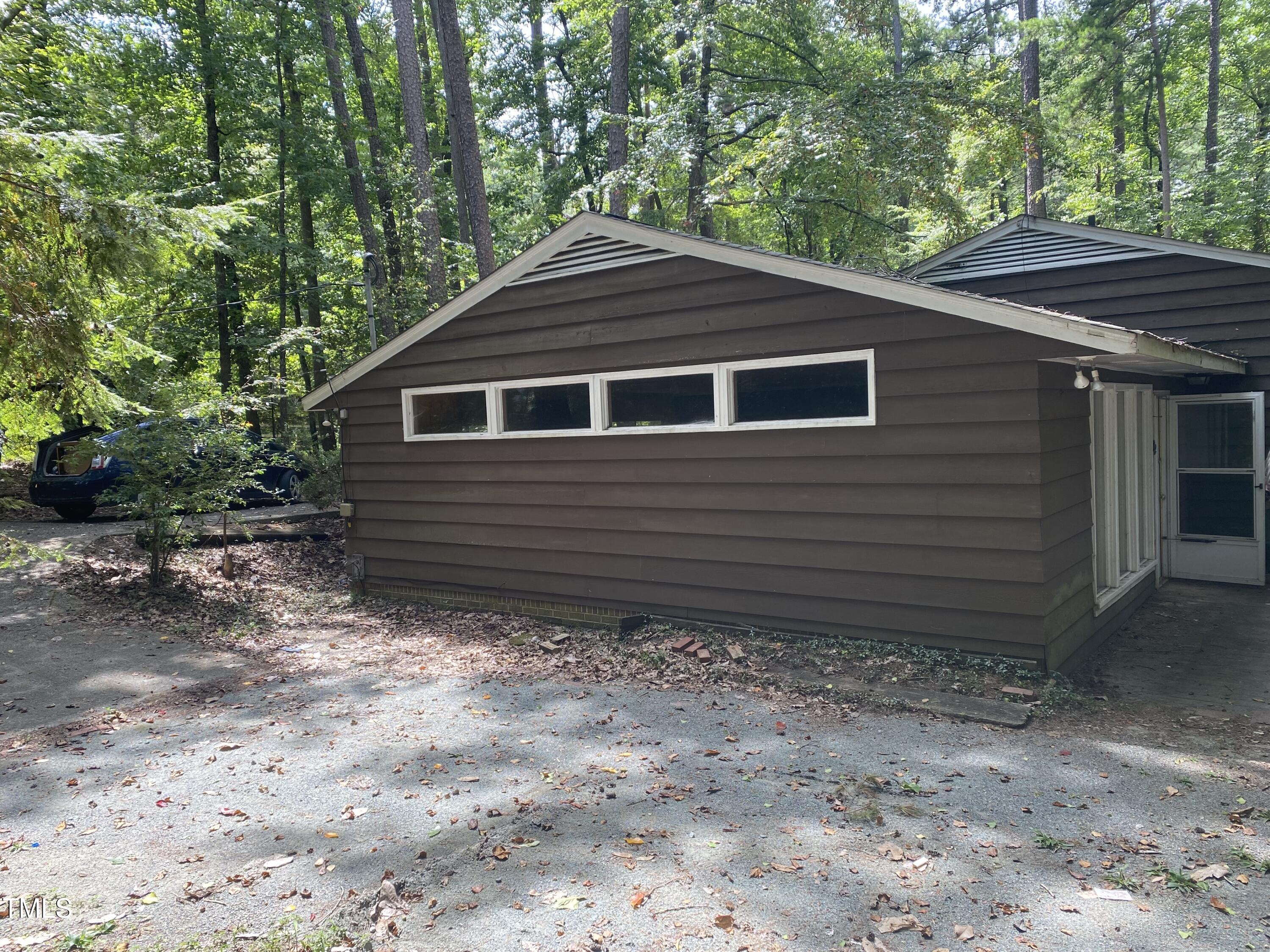 412 North Elliott Road Chapel Hill, NC 27514 - Photo 2 of 15 a house view with a backyard