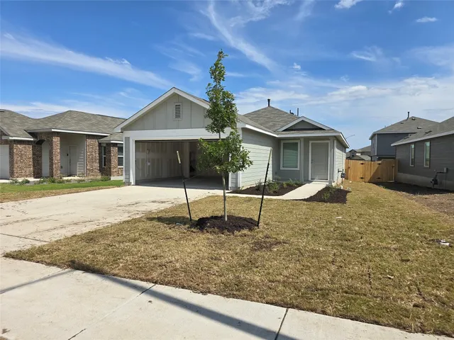 a house view with a outdoor space