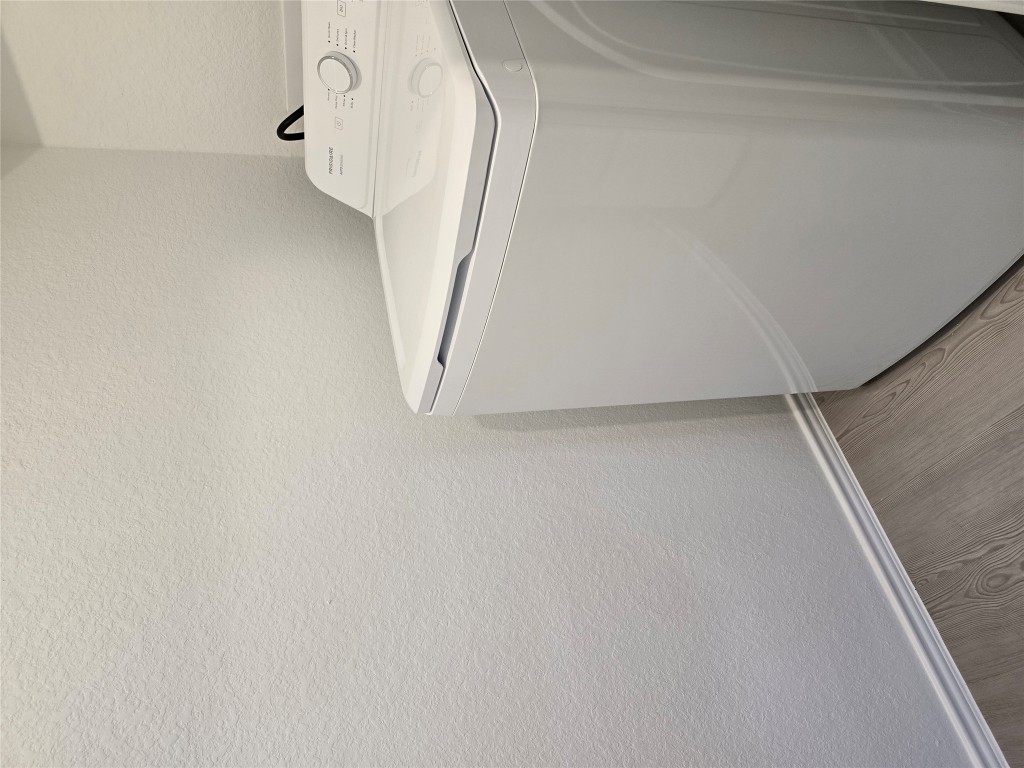 1036 Soapstone Pass Maxwell, TX 78656 - Photo 14 of 15 a utility room with dryer and washer