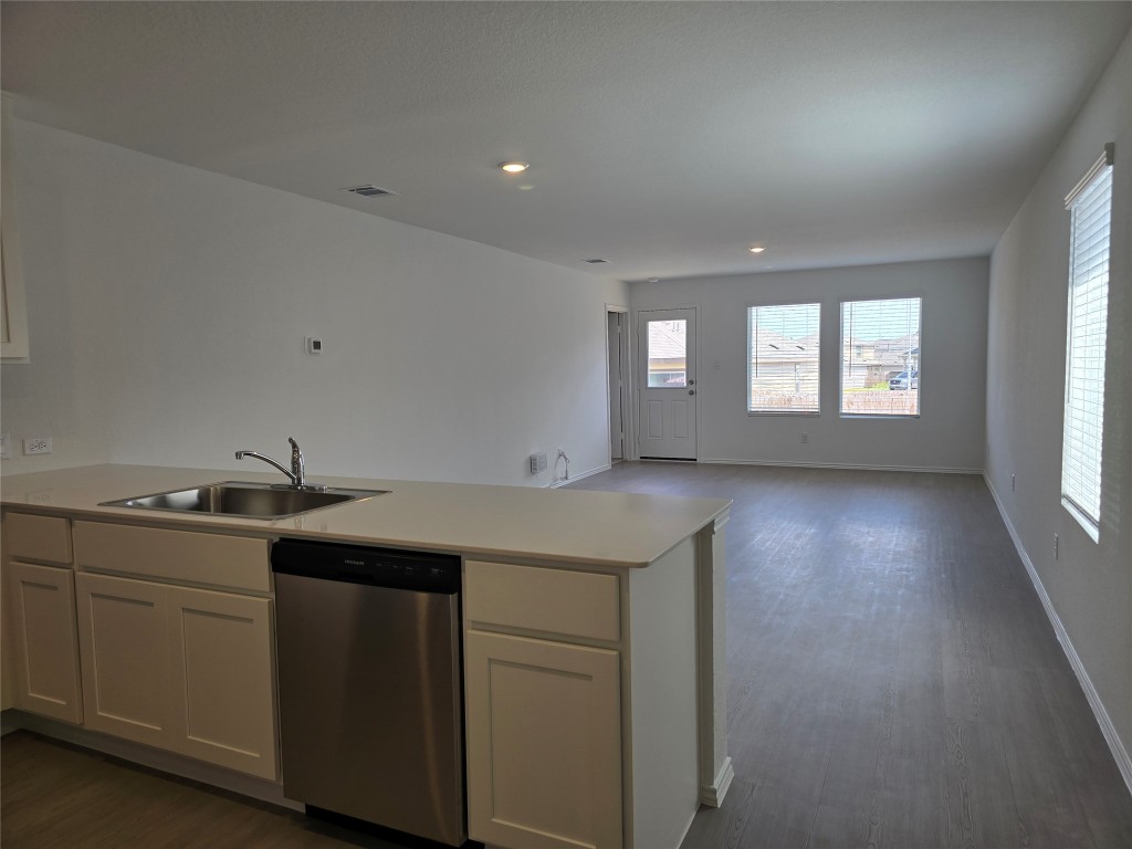 1036 Soapstone Pass Maxwell, TX 78656 - Photo 4 of 15 a kitchen with sink and cabinets
