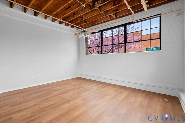 a view of outdoor space with wooden floor