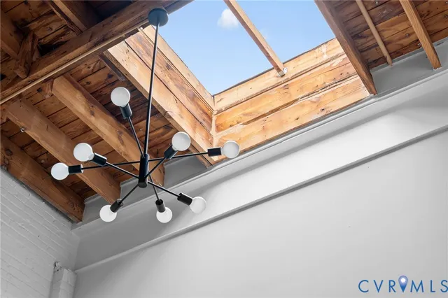 a bathroom with a sink and a white door