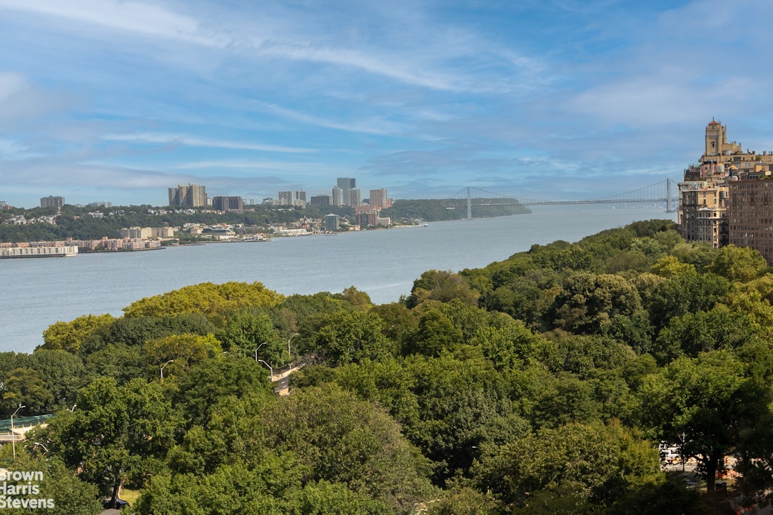 37 Riverside Drive, Unit 12B Manhattan, NY 10023 - Photo 17 of 20 a view of a lake with a city