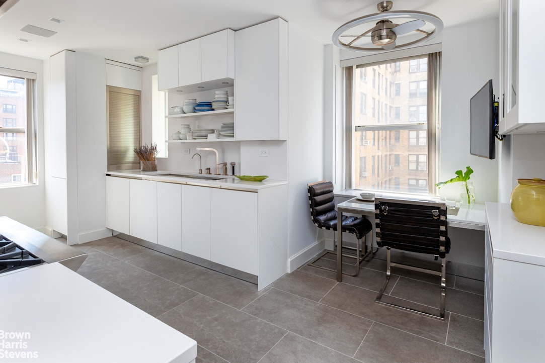 37 Riverside Drive, Unit 12B Manhattan, NY 10023 - Photo 6 of 20 a view of a dining room with furniture window and outside view