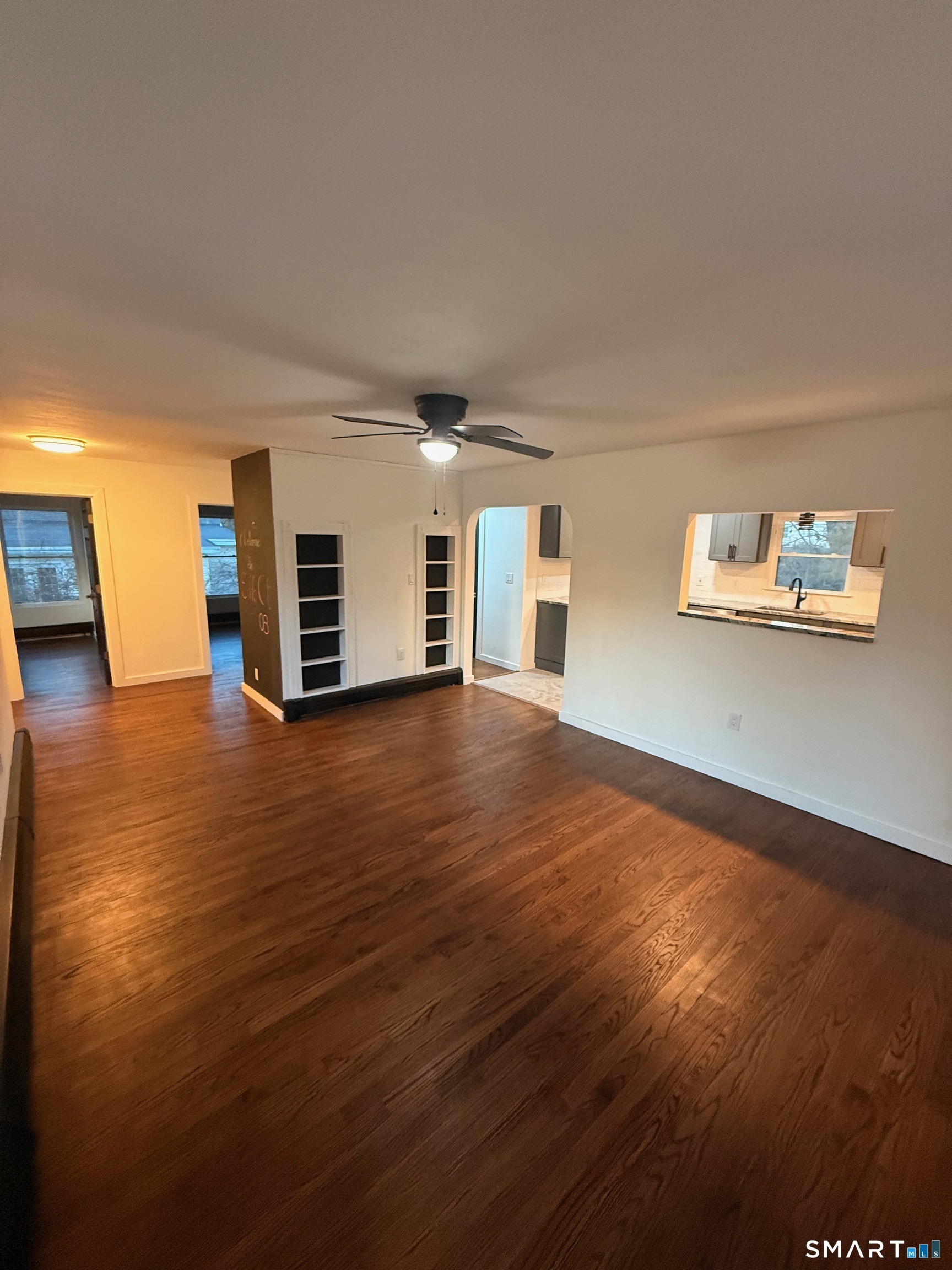 8 Eddy Road Montville, CT 06370 - Photo 11 of 13 a view of empty room with wooden floor and fan