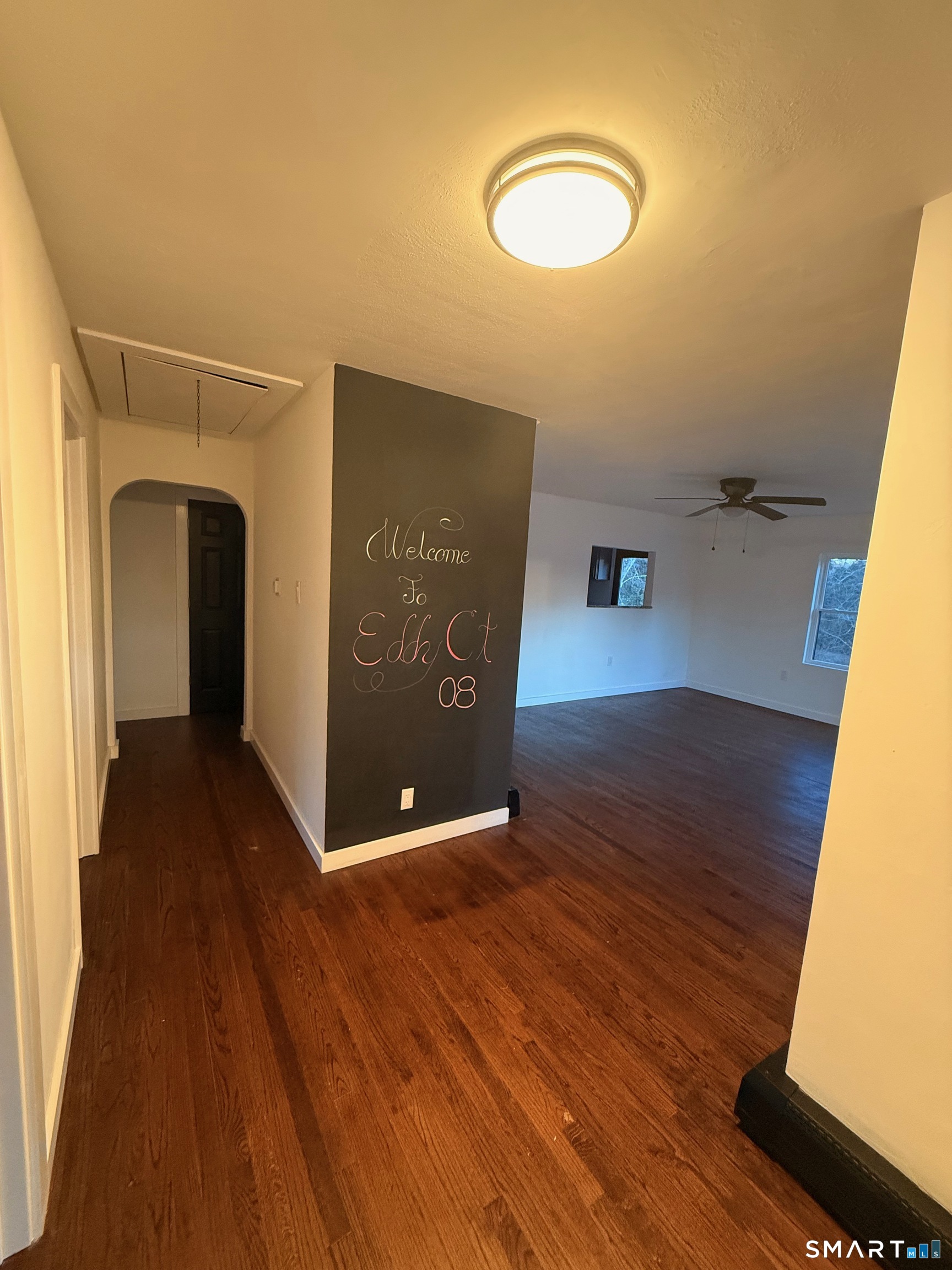8 Eddy Road Montville, CT 06370 - Photo 5 of 13 a view of a hallway with wooden floor