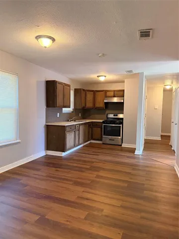a view of kitchen and microwave