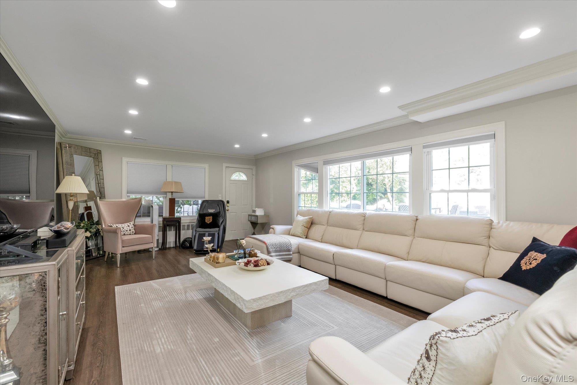 47 Pinewood Road Roslyn, NY 11576 - Photo 10 of 22 a living room with furniture and a window