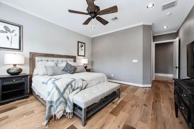 a kitchen with a sink appliances and cabinets