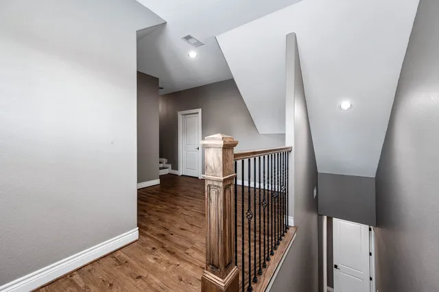 a bathroom with a shower sink and mirror